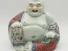 Un Buddha en porcelaine 25cm